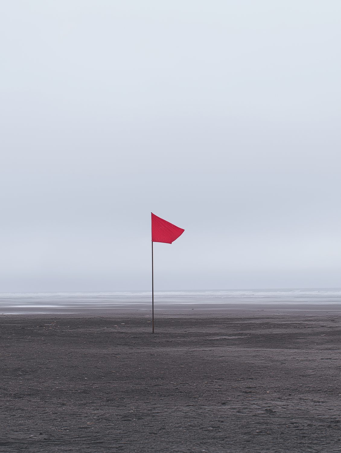 A person carefully examining a job posting, symbolizing vigilance in identifying red flags such as vague promises or commission-only structures.